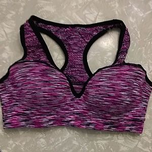 Pink Victoria's Secret sports bra.